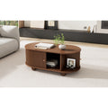 Oval Coffee Table with Sliding Doors – Oak