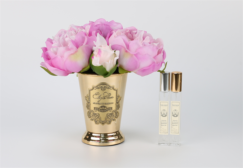 Peony bouquet in gold cone vase