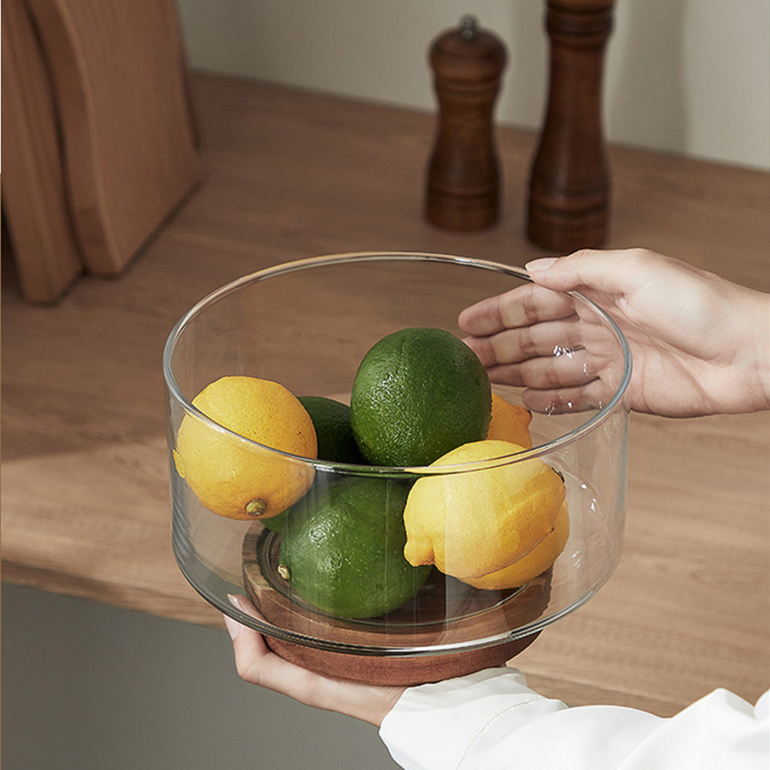 Glass footed bowl with wooden base