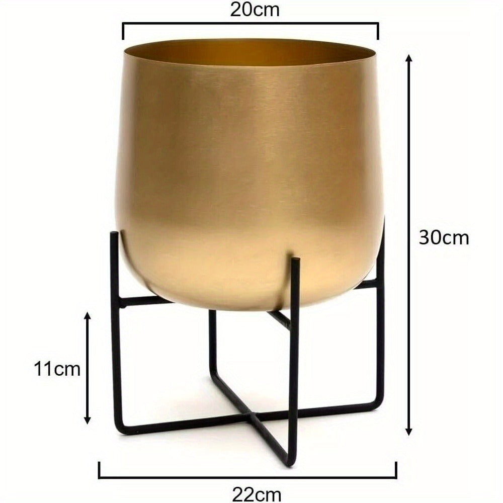 Gold planter with black metal stand