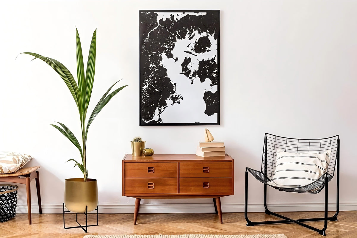 Gold planter with black metal stand