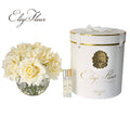 White rose bouquet in spherical glass vase
