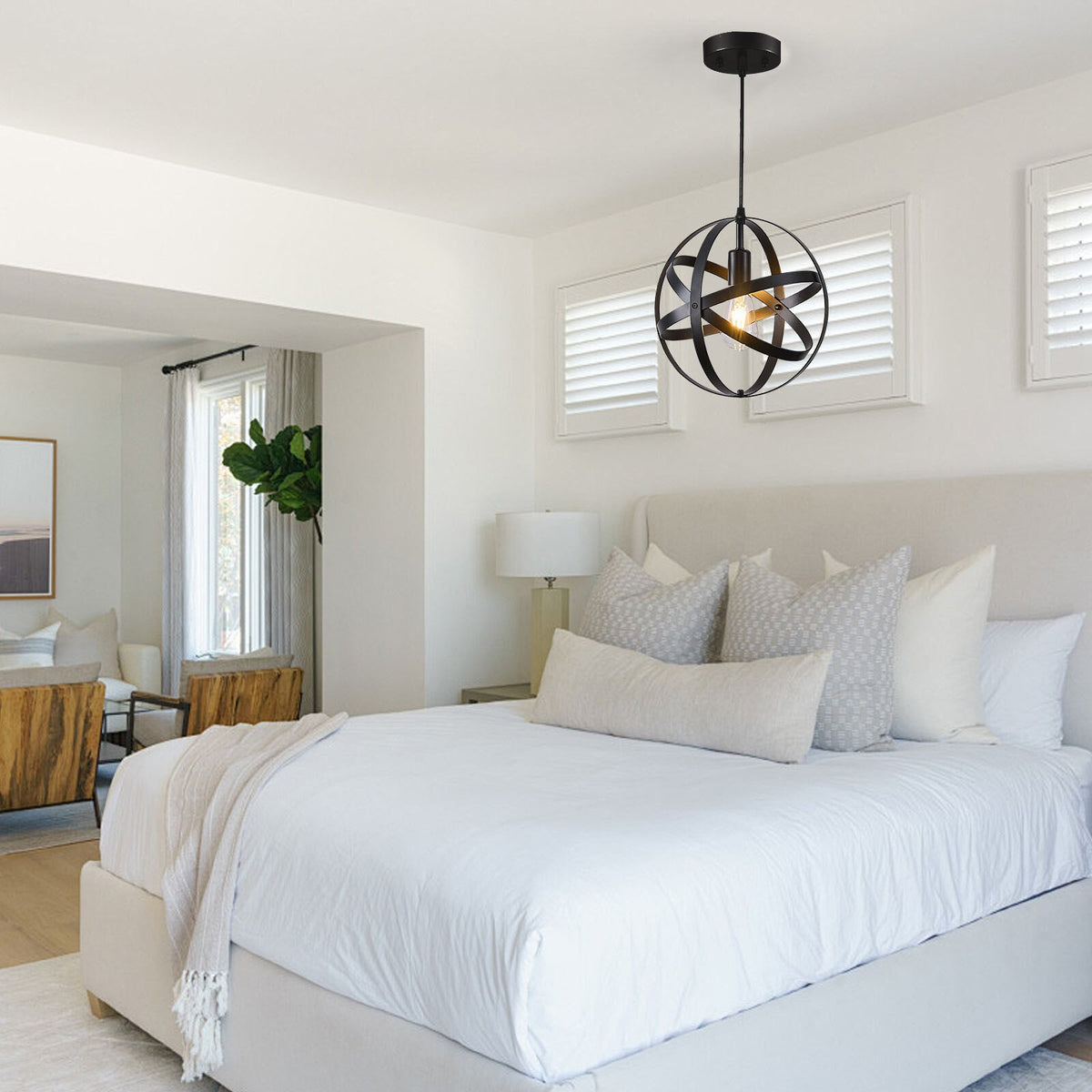 Black industrial orb pendant light