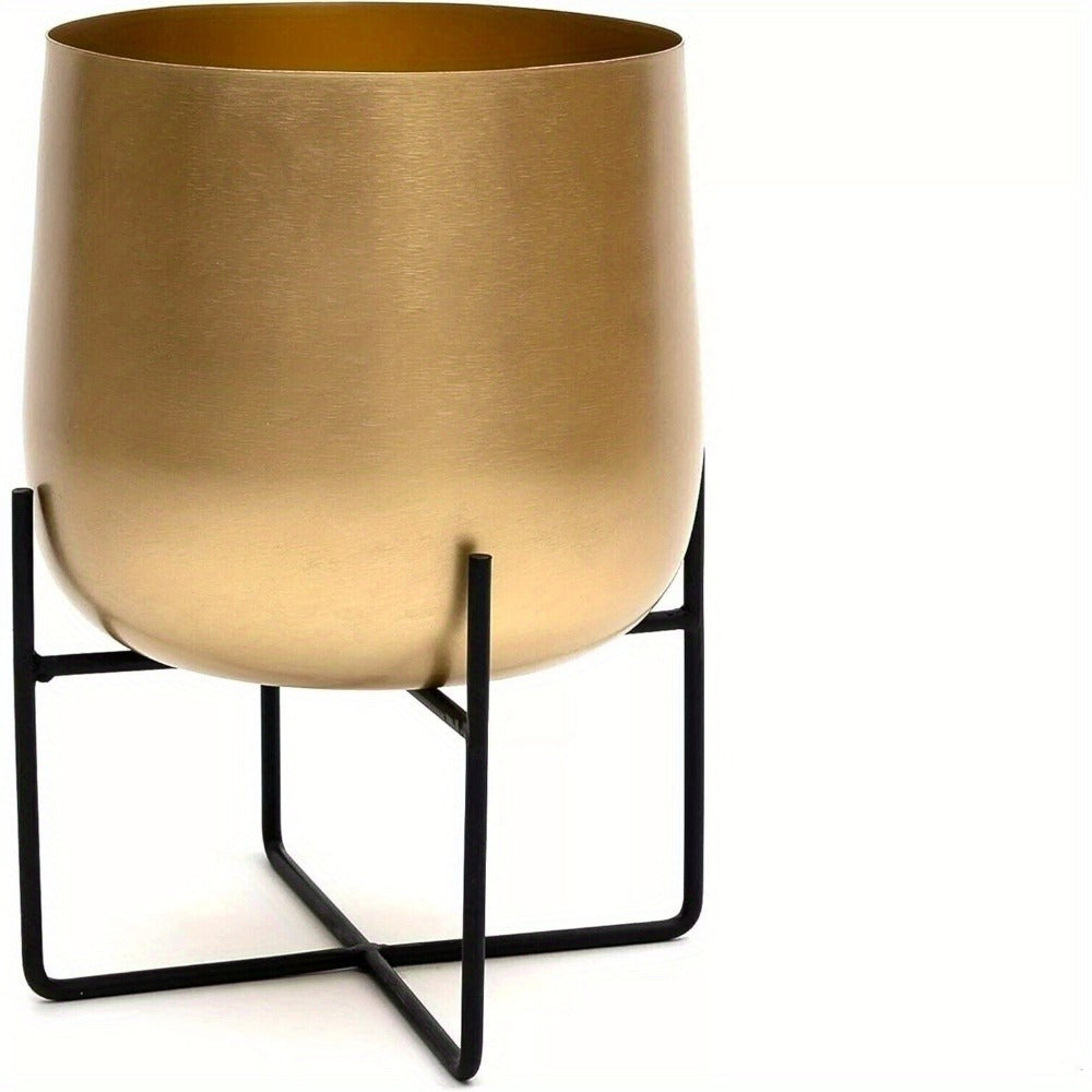 Gold planter with black metal stand