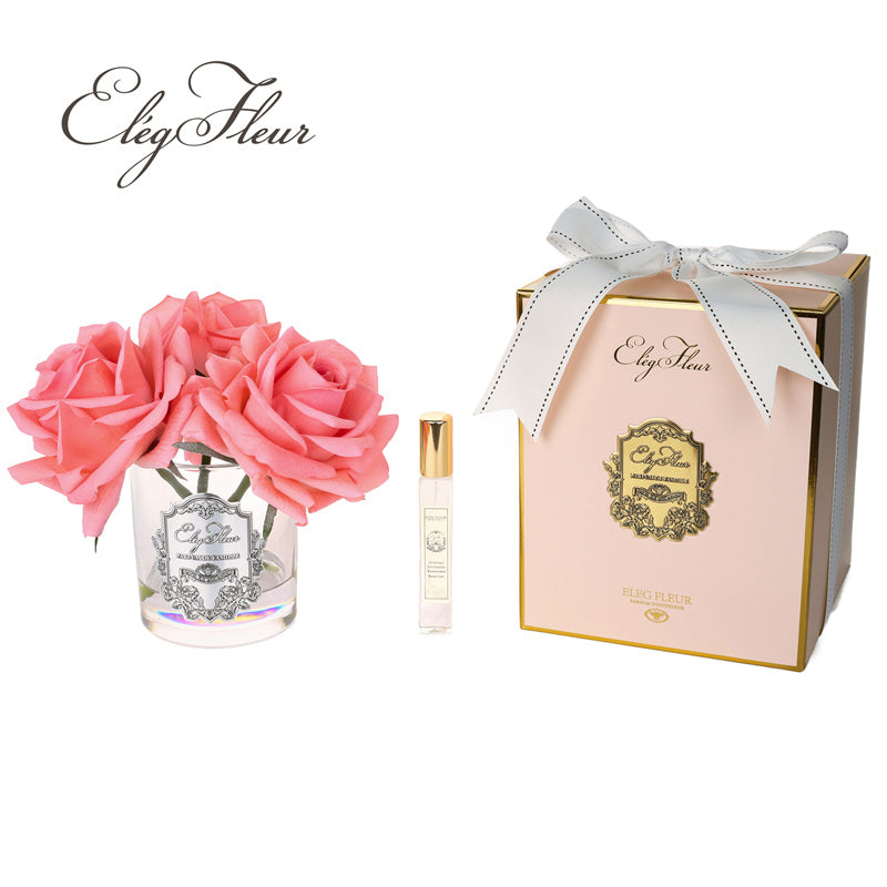 Deep pink rose bouquet in glass vase