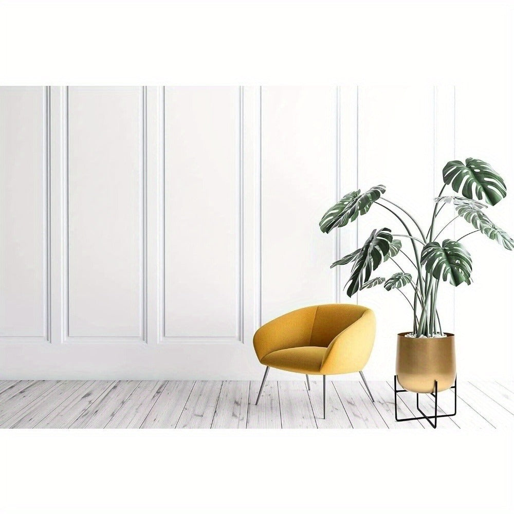 Gold planter with black metal stand