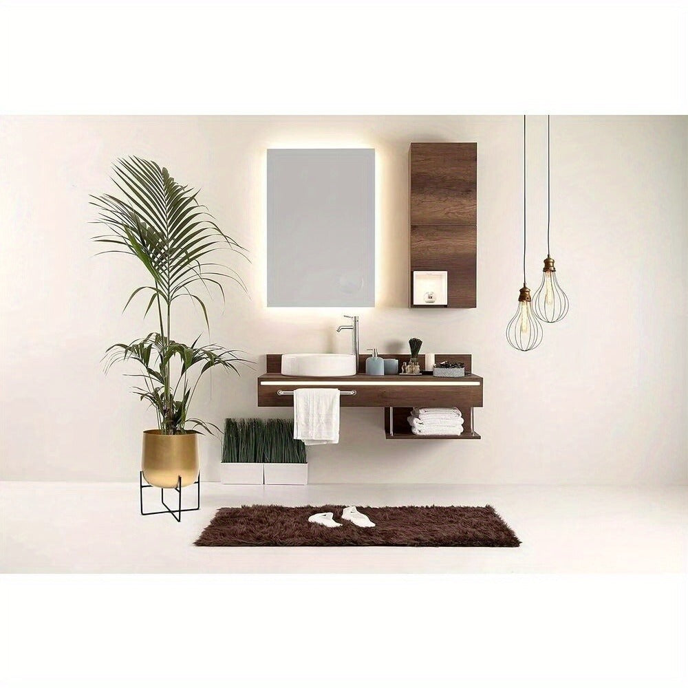 Gold planter with black metal stand