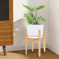 Adjustable bamboo plant stand