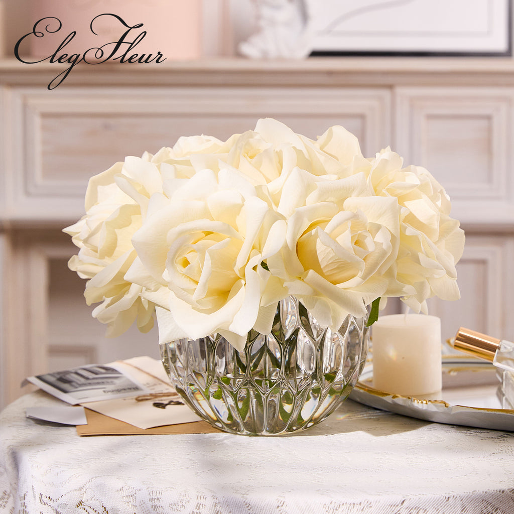 White rose bouquet in spherical glass vase