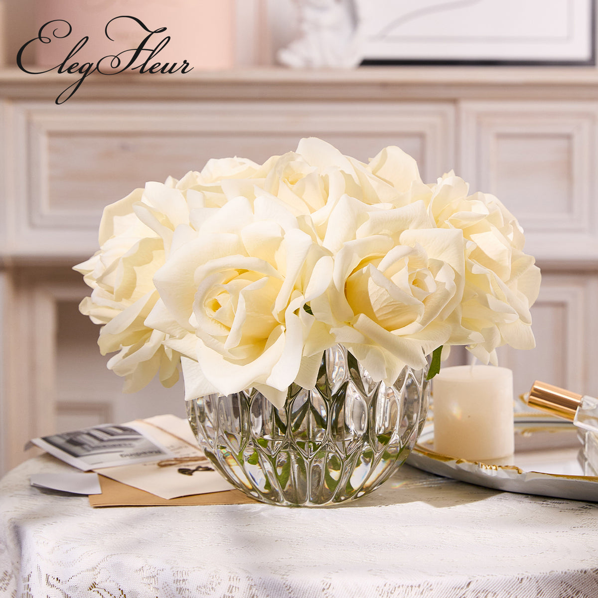 White rose bouquet in spherical glass vase